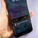A photo of a person holding the iPhone 14 Pro Max